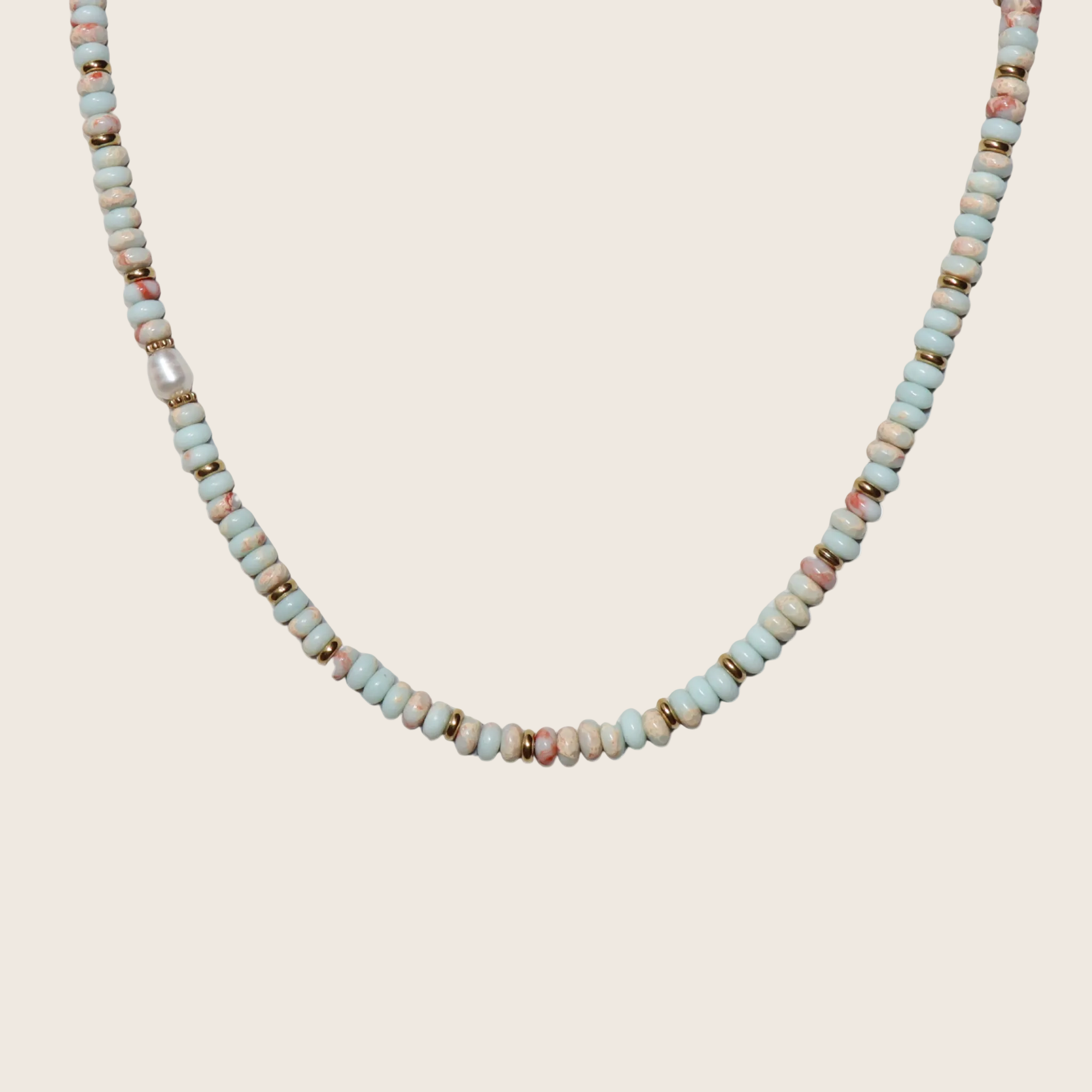 Necklace with small beads on a white background