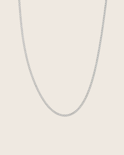 Silver chain necklace on a white background